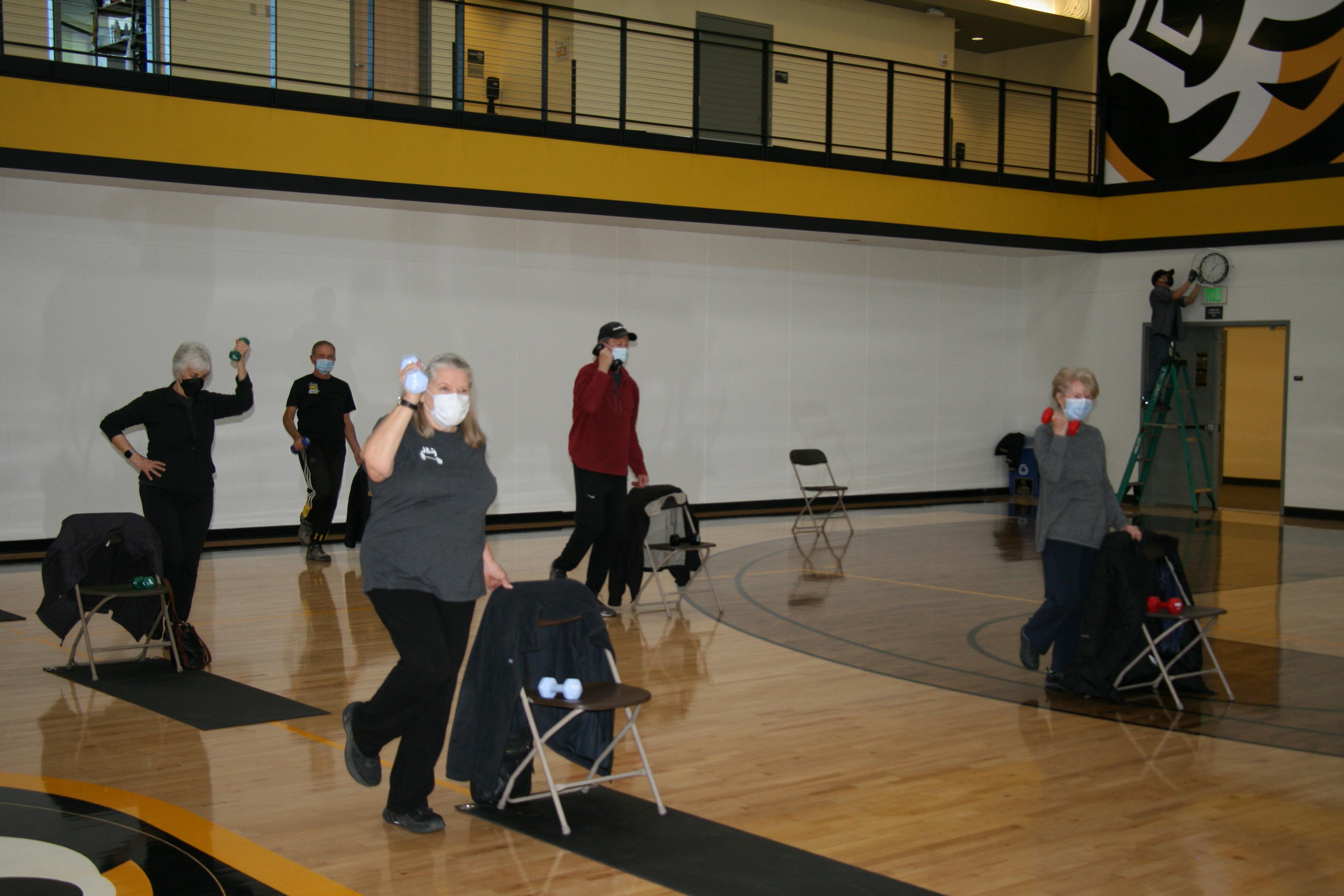 Fit 4 Life participants doing group exercises <span class="cc-gallery-credit"></span>